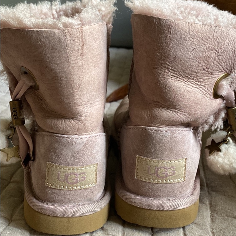 Kids Uggs, size 13. Washed out pink.  Fair condition.